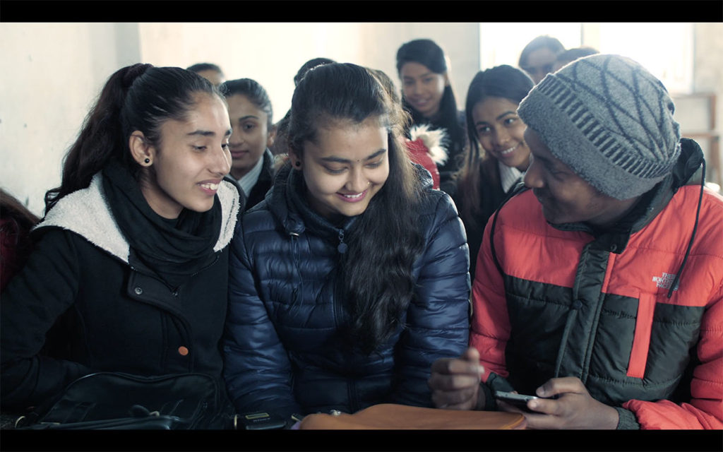Binod Pariyar 'Belly' with his friends in college